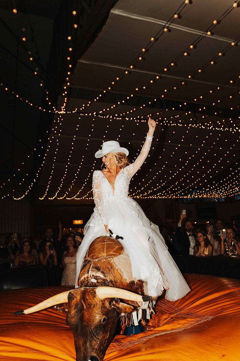 Buck Wild 16 - Sarah Penny Photography - Mechanical Bull Riding Rental Wedding Vendor Bride Bride on Buck Wild Bull - Sarah Penny Photography - Mechanical Bull Riding Rental Wedding Vendor Bride