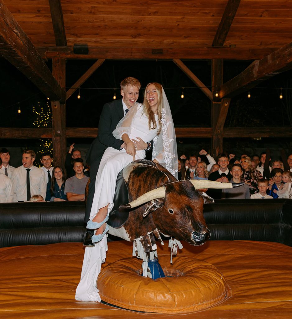 Buck Wild Bride and Groom - Bay + Bre Photo - Mechanical Bull Riding Rental Wedding Vendor